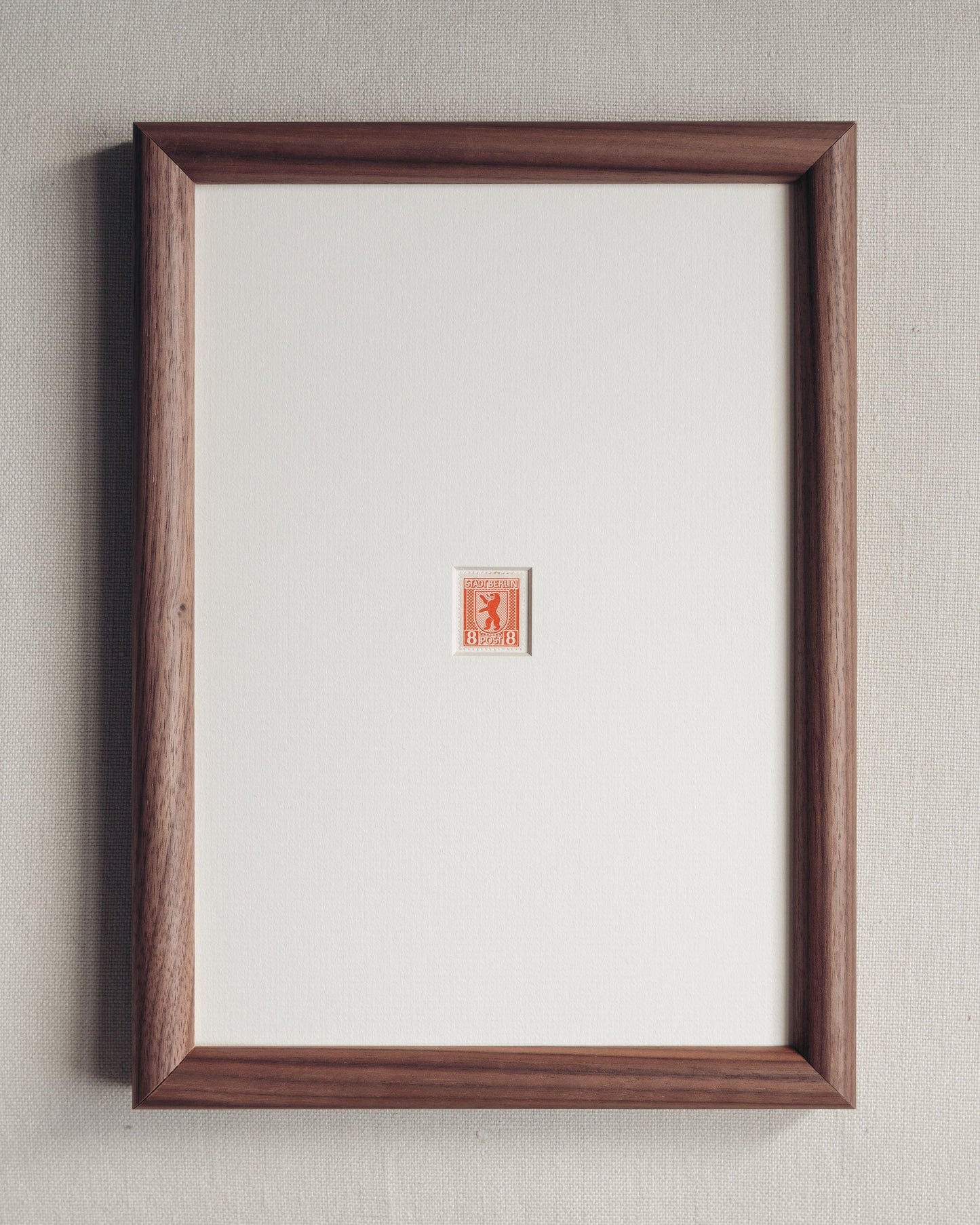 Walnut veneer frame with antique white mount with a stamp from Berlin that shows the Berlin Bear. Available only at Giddy Prints.