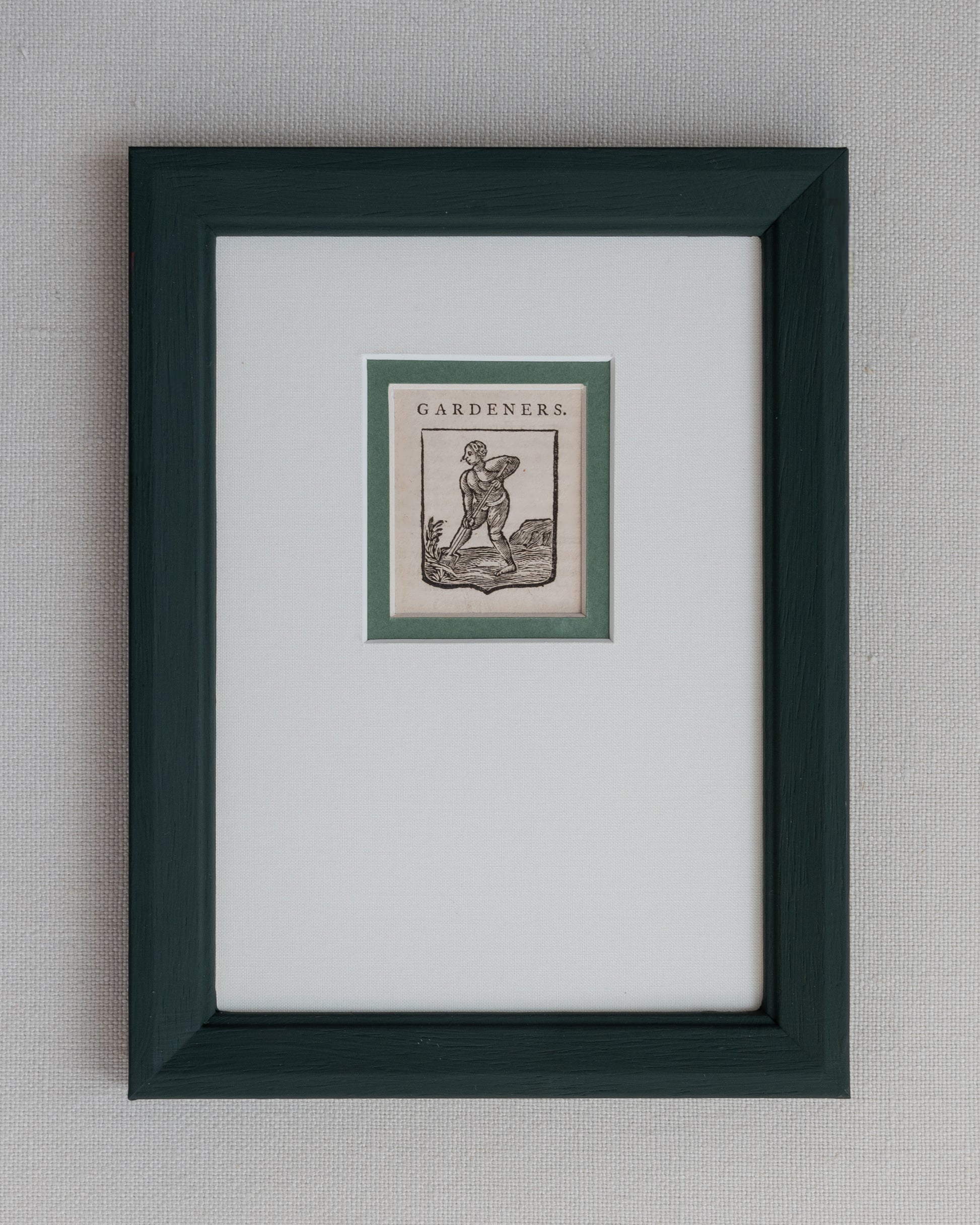 Handmade frame painted in bottle green with a double mount of linen and sage green. 